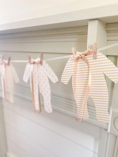 Create a cozy celebration with our warm baby shower decorations, perfect for adding a farmhouse or a cottage touch to any theme and making your special day unforgettable. * 5 - 8 1/4"W x 9 3/16"H large pajamas in elegant pink floral patterns * dusty beige  satin ribbon bows at the neck * cotton clothesline ribbon and clothespin included * pajamas are blank on the back caution: banner is not a toy **USPS experiences occasional transit delays, which is beyond our control. Unfortunately, for this reason, we cannot guarantee transit time/delivery-by dates. It is important to keep this possibility in mind when ordering, as we are unable to offer refunds or replacements due to postal delays.** Pink Ribbon Baby Shower Theme, Gold Pajamas, Baby Brunch, Bow Baby Shower, Satin Ribbon Bow, Pink Floral Pattern, Baby Shower Banner, Neutral Baby Shower, Pink Baby Shower