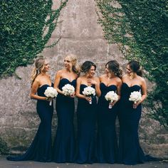 a group of women standing next to each other