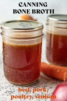 two jars filled with carrots and sauce on top of a marble counter next to an onion