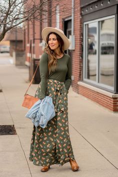 We love that this maxi looks like a long sleeve tee tucked into a maxi skirt with a tie waist because it takes the hard work out of pairing an outfit for you! Lightweight enough to wear all year round but we love pairing this with booties and a jacket for those cooler days! Cute And Simple Fall Outfits, Casual Dress Sneakers Outfit, Ankle Boots With Maxi Dress, Womens Winter Dress Outfits, Modest Thanksgiving Outfits Women Classy, Late Summer Church Outfits, Teacher Outfits Skirts And Dresses, Fall Long Dress Outfit, Modest But Cute Outfits