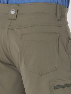 PERFORMANCE AND POCKET SPACE From exploring the outdoors to running errands around town, the men's Wrangler Authentics® comfort waist cargo short will keep you comfortable every step of the way. These performance shorts are crafted from a premium fabric blend with stretch, UPF 30 to shield you from the sun, and a moisture-wicking finish to keep you feeling dry. These cargo shorts for men come with a comfort flex waistband that adapts to every move you make, a relaxed fit for extra room, and a 10 Utility Cargo Shorts With Functional Pockets For Outdoor Activities, Functional Cargo Shorts With Pockets For Outdoor Work, Utility Cargo Shorts With Functional Pockets For Outdoor, Khaki Cargo Shorts For Outdoor Work, Midweight Cargo Pants With Pockets For Outdoor Work, Utility Bottoms With Functional Pockets For Adventure, Outdoor Khaki Cargo Shorts With Hip Pockets, Khaki Cargo Shorts With Hip Pockets For Outdoor, Functional Cargo Pants With Pockets For Adventure