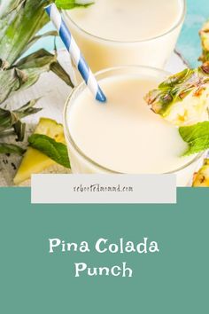 pina colada punch with pineapple and mint garnish on the side