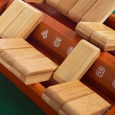 several wooden dominos sitting on top of each other