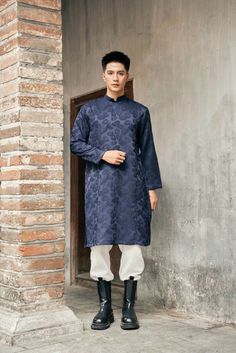 Modern navy blue ao dai with stitched embroidery feather pattern. Trendy and stylish fit for all occasion ! Size run smaller than regular US size pls inbox for more info. Traditional Blue Kurta For Fall, Blue Long Sleeve Kurta For Winter, Blue Long Sleeve Kurta For Fall, Blue Long Sleeve Winter Kurta, Elegant Blue Kurta For Winter, Traditional Blue Ao Dai For Formal Occasions, Ao Dai Men, Embroidery Feather, Feather Pattern