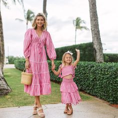 Effortless day into evening glamour never looked so gorgeous as in our Odette dress with its plunging V neck, curved empire seam with tassel detailing and full tiered skirt. Product Overview: 100% cotton woven ikat Length 48" Vacation V-neck Maxi Dress With Smocked Back, V-neck Smocked Maxi Dress For Vacation, Pink Ikat Print Summer Dress, Odette Dress, Spring V-neck Ikat Print Dress, Ikat Print V-neck Vacation Dress, Women Maxi, Tiered Skirt, Womens Maxi Dresses