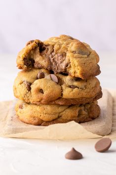 chocolate chip cookies stacked on top of each other