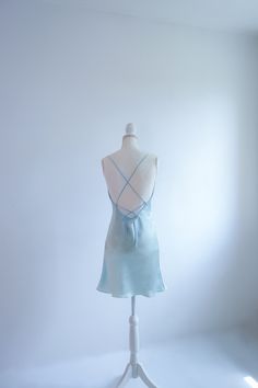 Size: XS - Bust 77 - 79cm - Waist 60 - 62cm - Hip 83 - 85cm - Front length without straps 68cm - color: Aquamarine    - very simple yet classy and elegant  mini / knee length silk dress - bias-cut design allows the beautiful flare and nuances  - a perfect addition for your minimalistic, refined wardrobe - back open design with adjustable straps - 100% handmade in Germany with care and adoration, supporting you to uplift your energy and self-loving consciousness Made with 100% mulberry silk charm Slip Dress Satin, Dress Minimalist, Minimalist Dresses, Silk Slip Dress, Dress Satin, Silk Mini Dress, Open Design, Silk Charmeuse, Satin Slip Dress