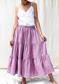 "Tiered linen skirt with an elasticated waistband in a \"lilac\" color. - Handmade in our studio from 100% pure linen - Elasticated waistband - Side seam pockets - Hand ruffled skirt with side seam pockets - Mid-calf length FABRIC&CARE Available in any other color of listed linen. We use medium weight and 100 % Oeko-Tex certified linen. Hand wash or gently machine washable 30oC, hang dry recommended, iron on medium. FIT and SIZE: Simona is wearing a \"Lilac\" skirt in size S and is 172 cm/5' Lilac Skirt, Womens Skirts, Special Clothes, Ruffled Skirt, Lilac Color, Linen Skirt, Beautiful Skirts, Tier Skirt, Country Outfits