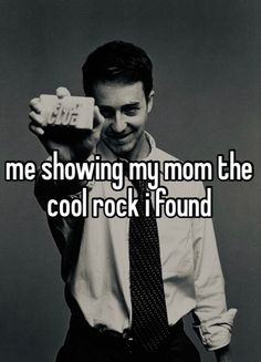 a man holding up a camera with the words me showing my mom the cool rock i found