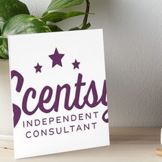 a greeting card with the words scents's independent consultant on it next to a potted plant