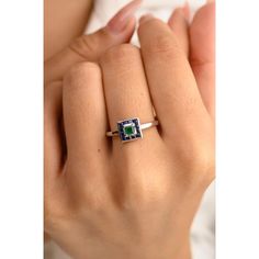 This is part of Chairish’s Fine Jewelry assortment.  Art Deco Blue Sapphire Emerald Square Shape Ring in 14K Gold featuring natural blue sapphire and emerald of 0.59 carats. The gorgeous handcrafted ring goes with every style. Sapphire stimulates concentration and reduces stress and emerald enhances the intellectual capacity. Designed with square cut blue sapphire and emerald making a square that makes it a perfect fit to wear it on your occasion or style it with any of your basic outfit to give it a glam. This is a perfect Handmade Jewelry, Bridal Shower Gift, Valentine Gift, Gift For Sister, Mother Daughter Gift, Bride To Be Gift, Bridesmaid Gift, Mom Gift, BFF Gift, Best Friend Gift, Anniversary Present, Wife Gift, Gift for Her or any Holiday Gift for Mother, Sister, Daughter, Grandma, Blue Emerald Ring With Halo Setting, Blue Emerald Rings With Halo Setting, Green Sapphire Rings With Halo Setting, Blue Emerald Halo Setting Ring, Blue Emerald Ring With Round Cut, Blue Emerald Ring For May Birthstone, Round Shape, Blue Emerald Ring For May Birthstone, Green Sapphire Jewelry With Halo Setting, Blue Formal Rings For May Birthstone