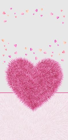 a pink heart on a white background with confetti