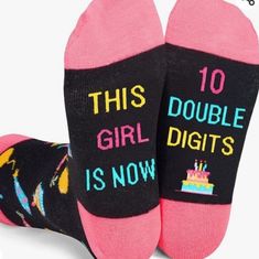 two pairs of socks that say, this girl is now 10 and have cake on them