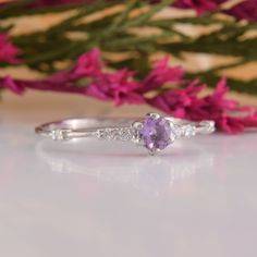 Womens Amethyst Promise Ring, Amethyst Silver Ring, Unique Promise Ring, Dainty Engagement Ring, Amethyst Jewelry, Silver Promise Ring WE OFFER UNLIMITED PERIOD INSTALLMENTS PLAN This is a beautiful, stunning, feminine ring that works well for all occasions, styles, and ages. You will love it! Ring information: Main stone: Amethyst Approximate size: 4.0mm Accent stones: Cubic zirconia Approximate size: 1.75mm (6 stones) Metal type: Silver Metal stamp: 925 sterling silver Installment Payments We Dainty Engagement Ring, Dainty Wedding Band, Unique Promise Rings, Silver Promise Rings, Dainty Engagement, Dainty Engagement Rings, Art Deco Wedding Band, Mom Ring, Fancy Gifts