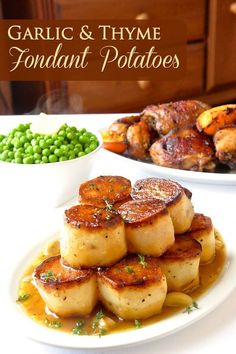 garlic and thyme fondant potatoes on a white plate with green peas in the background