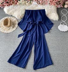 Stylish strapless irregular jumpsuitFabric: blendedColor: bugrundy, blue, pink, white, khaki, blackSize(cm): free sizelength 114 bust 60-94 waist 58-94 One Shoulder Jumpsuit For Summer, Chic Off-shoulder Blue Jumpsuit, Chic One-shoulder Jumpsuit In Solid Color, Trendy Blue Strapless Jumpsuits And Rompers, Blue Strapless Wide Leg Jumpsuit For Summer, Chic Solid Bandeau Jumpsuits And Rompers, Jumpsuit Styles, Cute Jumpsuits, Korean Study