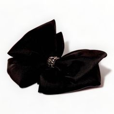 A magnificent designer large double satin bow in black, that creates a very dramatic effect when worn. Each of the bespoke black satin bows are hand made and gathered together with a great diamante and cut crystal bead center, perfect party wear hair accessory. Comes with its own branded Sienna Likes To Party Drawstring Gift Pouch for safe keeping. Luxury Black Bow For Evening, Black Ribbon Bow For Evening, Black Elegant Hair Bow, Black Satin Hair Bow, Black Bow Hair Clip, Small Hair Bows, Bow Hair Clip, Bow Accessories, Bow Hair