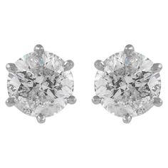 Classic diamond stud earrings, each stone EGL certified. Two matching round brilliant diamonds 2.25 carats total. Both stones F color grad and I1 clarity grade. 14k white gold, 1.45 grams. Accommodated with an up-to-date digital appraisal by a GIA G.G. once purchased, upon request. Please contact us with any questions. EGL Report Number 905700403 Item Number EAA007 Earrings White Gold, Diamond Stud Earrings, Earrings White, Diamond Stud, Brilliant Diamond, Diamond Earrings Studs, Diamond Studs, Jewelry Earrings Studs, Round Brilliant