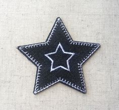 a black and white star patch on fabric