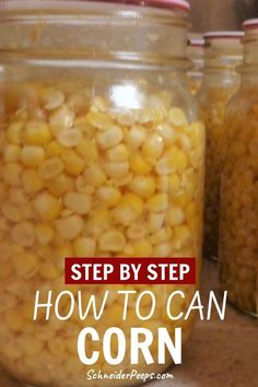 three jars filled with corn sitting on top of a counter