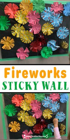 the fire works sticky wall is made with construction paper and colored flowers on black background