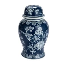 a blue and white vase with floral designs on it's lid is shown in front of a white background