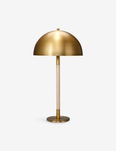 a gold lamp on a white background