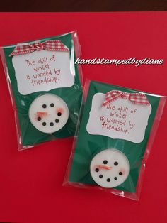 two snowman buttons in plastic bags on a red surface with the words, the dill of which is used by friends