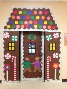 a door decorated to look like a gingerbread house