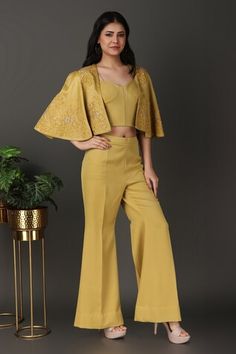 Greenish yellow jacket with floral thread and sequin embroidery. Paired with a padded bustier and flared pant. - Aza Fashions Sequin Embroidery, Yellow Jacket, Work Jacket, Sequins Embroidery, Work Jackets, Pants Pattern, Pant Set, Set For Women, Aza Fashion