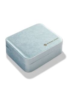 a small white box sitting on top of a table