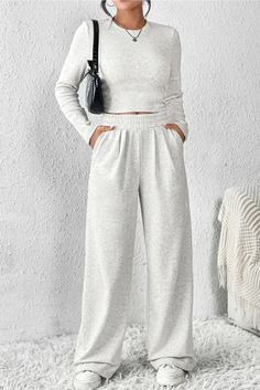 Elevate your wardrobe with our Beige Crop Top and Wide Leg Pants Two Piece Set! Perfect for daily wear, this high-quality, durable set features a stylish crop top and laid-back wide leg pants. Mix and match with ease to create versatile looks for any occasion. Embrace comfort and flair with this trendy ensemble! Beige Crop Top, Two Piece Loungewear, Crop Top And Pants Set, Top And Wide Leg Pants, Relaxed Aesthetic, Crop Top And Pants, Cozy Winter Fashion, Beige Crop Tops, Stylish Crop Top