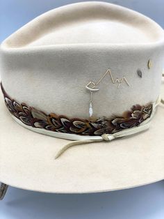 Spoor – JW Bennett Custom Feather Hat Bands For Country Events, Vintage Hat Bands With Feathers For Country Events, Vintage Feather Hat Bands For Country Events, Leather Feather Hat Band, Bohemian Hat Bands With Feathers For Western-themed Events, Vintage Feather Hat Bands For Western-themed Events, Cowboy Hat Feather Band, Western-themed Felt Hat With Feathers, Western-themed Fedora With Feathers