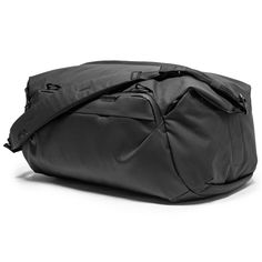 Are you in search of a versatile, stylish, and practical travel companion? Look no further than the Peak Design Travel Duffel 35L. This timeless and utilitarian duffel bag is not only aesthetically pleasing but also incredibly functional, making it an ideal choice for weekend getaways, overnight trips, gym visits, or as an additional carry-on for your larger travel luggage. Boasting a carry-on size with a generous 35L capacity, this duffel bag is designed to accommodate all your essentials with Camera Bag Backpack, 30l Backpack, Tech Pouch, Large Travel Bag, Carry On Size, Peak Design, Sac Week End, Padded Top, Travel Duffle