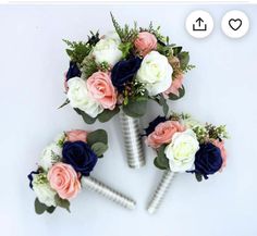 wedding bouquets with flowers arranged on top of each other in the shape of v