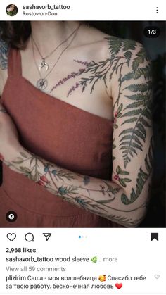 a woman with tattoos on her arms and chest