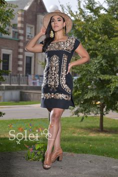 This Beautiful Mexican Golden Embroidered Floral Dress is the perfect dress for a fun night out or a special event. It is full of elegant Golden embroidered flowers and has some crocheted details. This dress has ties on the back in order to adjust the fit. The earrings is available to buy here https://www.etsy.com/es/listing/673012637/aretes-mexicanos-de-filigrana-aretes?ref=shop_home_active_7&pro=1&frs=1 Black Embroidered Dress For Night Out, Fitted Embroidered Black Mini Dress, Black Embroidered Summer Party Dress, Black Embroidered Dress For Summer Party, Embroidered Dresses For Night Out, Embroidered Embellished Short Sleeve Dress For Party, Black Embroidered Fitted Dress For Summer, Festive Black Dress With Floral Embroidery, Party Embellished Embroidered Dress With Short Sleeves