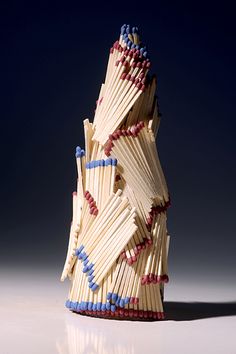 a stack of matches sitting on top of a table