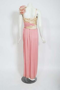 For Sale on 1stDibs - A breathtaking pale-pink silk and ivory satin custom-made 20th Century Fox gown dating back to the early 1960's. Though I am unsure of which production Floor-length Cream Evening Dress For Banquet, Cream Floor-length Evening Dress For Banquet, Cream Silk Gown With Fitted Bodice, Silk Cream Evening Dress With Fitted Bodice, Silk Evening Gown With Boned Bodice, Silk Gown With Boned Bodice For Evening, Cream Silk Evening Gown, Vintage Silk Evening Dress For Gala, Pink Silk Gown With Pleated Bodice