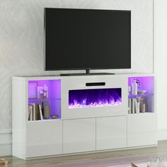 a white entertainment center with an electric fireplace and purple flames on the wall behind it