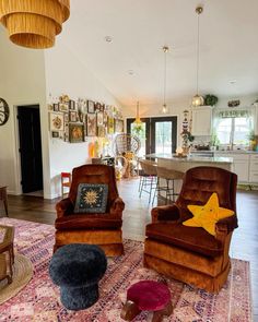 a living room filled with lots of furniture and decor