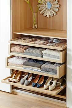 an organized closet with shoes and other items