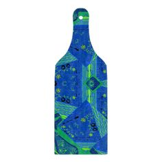 a blue and green cutting board with an abstract design on the bottom, featuring fish