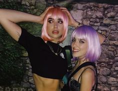 two women with pink hair are posing for a photo on their instagram accounts