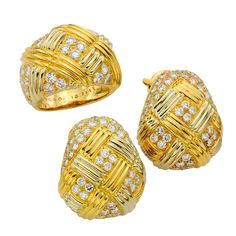 A classic wide band with a matching pair of gorgeous earrings from Van Cleef and Arpels! This jewelry set is crafted in 18k yellow gold and features a basket-weave motif pave-set with 6 carats of sparkling round diamonds. Displays gold stamp and French assay marks. METAL: 18k Yellow Gold GRAM WEIGHT: 38 STONE: White Diamond CARAT WEIGHT: 6 DIAMOND COLOR: F-G DIAMOND CLARITY: VVS2-VS1 DIMENSIONS: 17mm Ring Width - 7mm Length RING SIZE: 6 - EU 52. Resizable - $35 for each size up and $25 for each size down. SERIAL NUMBER: 137111, M37111