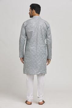 Pastel grey cotton kurta with sequins and thread embroidered checkered pattern. Comes with churidar. - Aza Fashions Festive Embroidered Gray Sets, Festive Unstitched Gray Kurta, Silver Kurta With Resham Embroidery For Diwali, Silver Kurta With Resham Embroidery For Festivals, Gray Straight Kurta For Festive Occasions, Festive Silver Kurta With Resham Embroidery, Festive Gray Sets With Chikankari Embroidery, Unstitched Silver Kurta With Resham Embroidery, Traditional Gray Kurta For Diwali