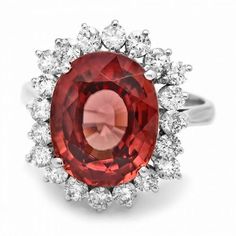 10.00 Carats Natural Red Zircon and Diamond 14K Solid White Gold Ring Total Natural Zircon Weight is: Approx. 8.80 Carats Zircon Measures: Approx. 13.00 x 10.00mm Natural Round Diamonds Weight: Approx. 1.20 Carats (color G-H / Clarity SI1-SI2) Ring total weight: Approx. 6.4 grams Disclaimer: all weights, measurements and colors are approximate and may vary slightly from the listed dimensions or as seen in the image. All pictures are magnified to show the smallest of details. Please, refer to the Etsy Gold Ring, Cz Jewelry, White Gold Ring, Natural Red, Quality Diamonds, Womens Jewelry Rings, Yellow Gold Rings, Cocktail Rings, White Gold Rings