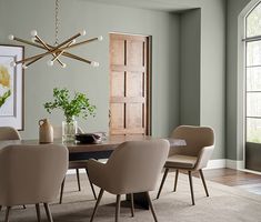 an image of a dining room setting with the text evergreen fog shervin - williams