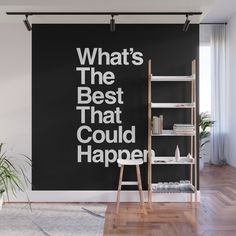 a black and white wall mural with the words what's the best that could happen?