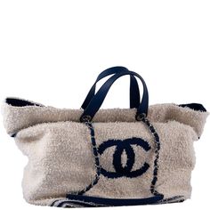 This lovely CHANEL Venise Biarritz Shopping Tote Terry Cloth in size Large offers style and durability. Great for the beach or just walking around the in the Hamptons or St. Tropez. Kept in Store Fresh condition by a discerning Chanel Collector. Exterior: Blue & WhiteMaterial: Textile & Nylon 20"W x 20"H x 9"D 4" handle drop Condition:Â Store Fresh Chanel Chain, Casual Luxury, Ysl Shoes, Chanel Tote, St Tropez, Dior Shoes, Functional Accessories, Blue Accents, Shopping Tote